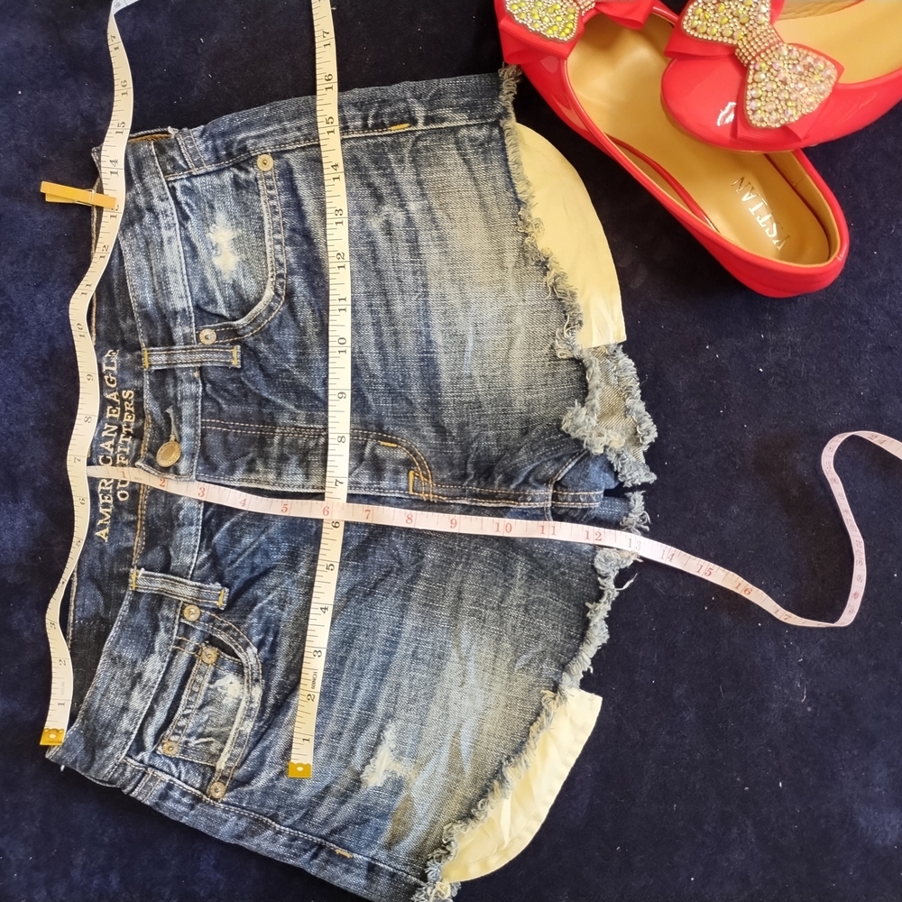 Distressed Denim Shorts.